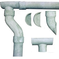 Asbestos cement gutters and downpipe